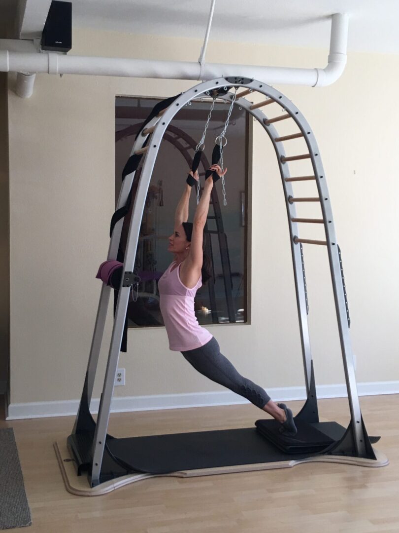 Dominique using a back stretcher for body health
